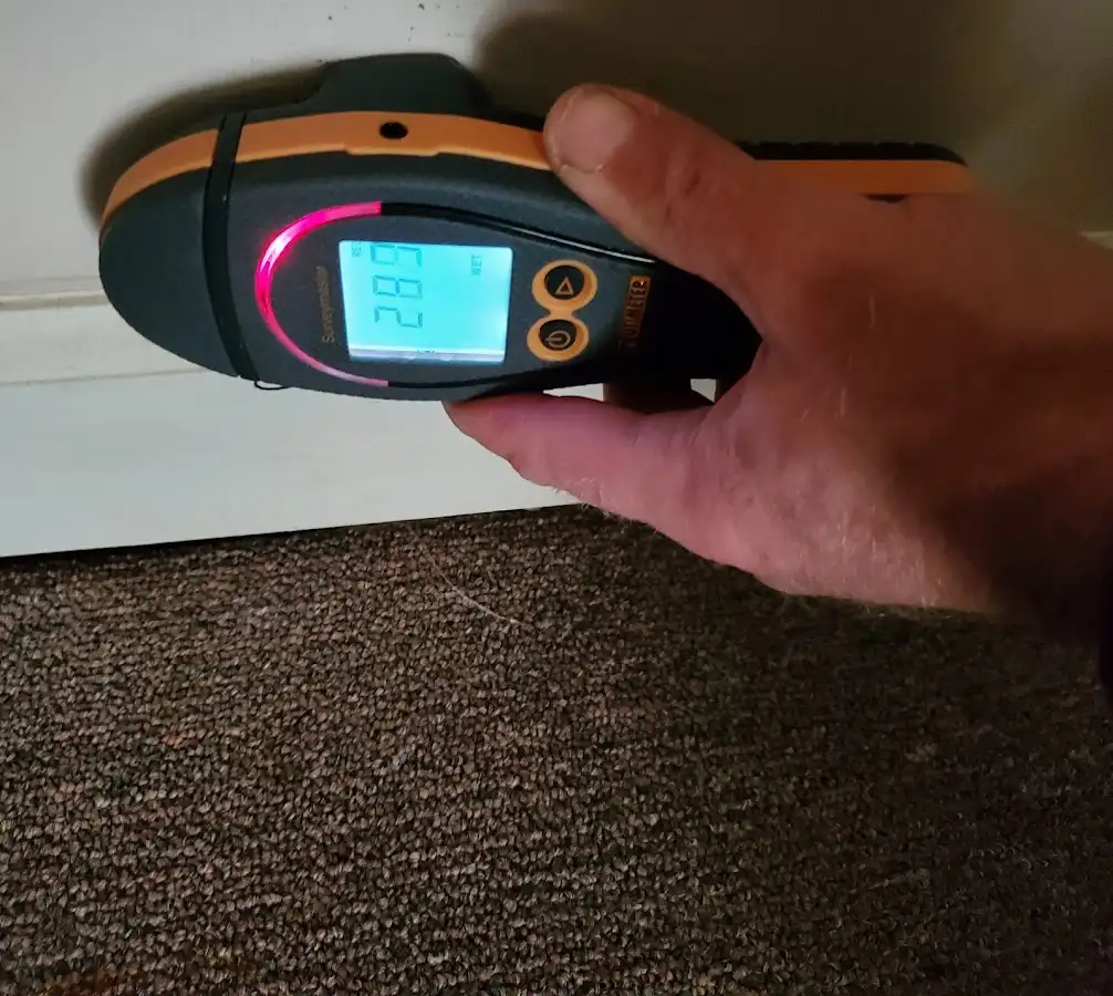 Moisture detection at baseboard during Burst Pipe Cleanup in Tallmadge